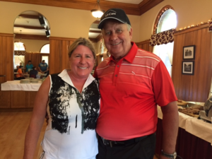 2015 Longest Drive (Female) Winner, Smith, Costello, & Crawford’s Sue Spinale, of Lynn, with All Care President & CEO Shawn Potter, of Hamilton