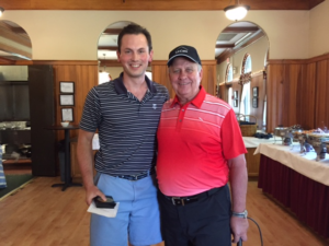 2015 Longest Drive (Male) Winner Kevin McCarthy of Boston with All Care President & CEO Shawn Potter of Hamilton